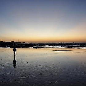 Sunset and Karen Leavitt at Playa Tamarindo, Tamarindo, Costa Rica, December 30 2009. - over_kind_man