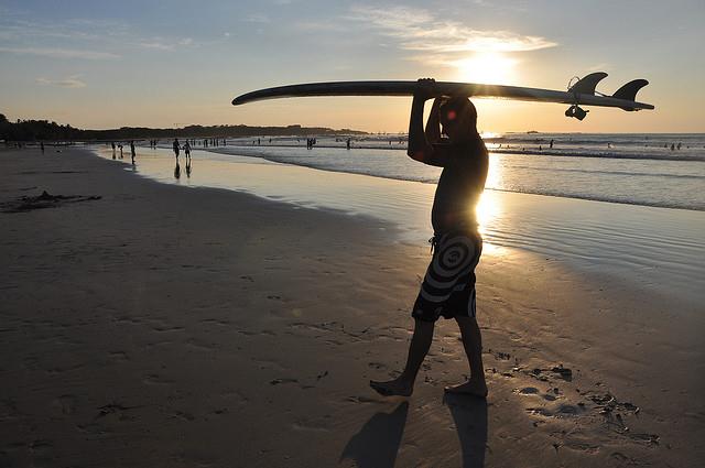 Mike Vondran coming back from surfing at Tamarindo, Costa Rica, December 28 2009.
